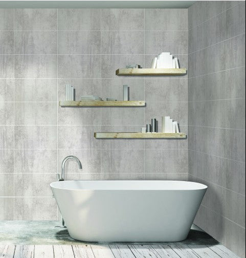 Modern bathroom with freestanding bathtub and glass shower enclosure.